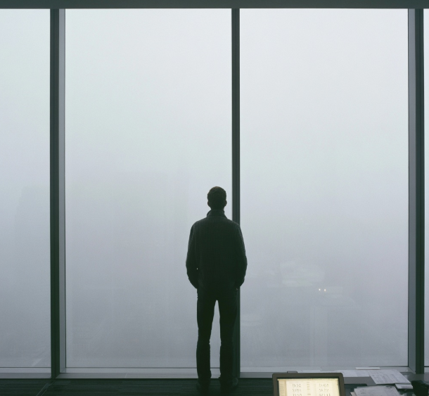 Business coach looking out at the horizon, ready to move forward